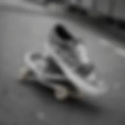 Black and white camo Vans on a skateboard