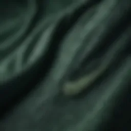 A close-up view of the dark green Nike hoodie showcasing the fabric texture